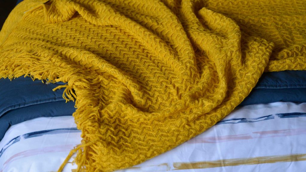 turmeric yellow loose knit throw