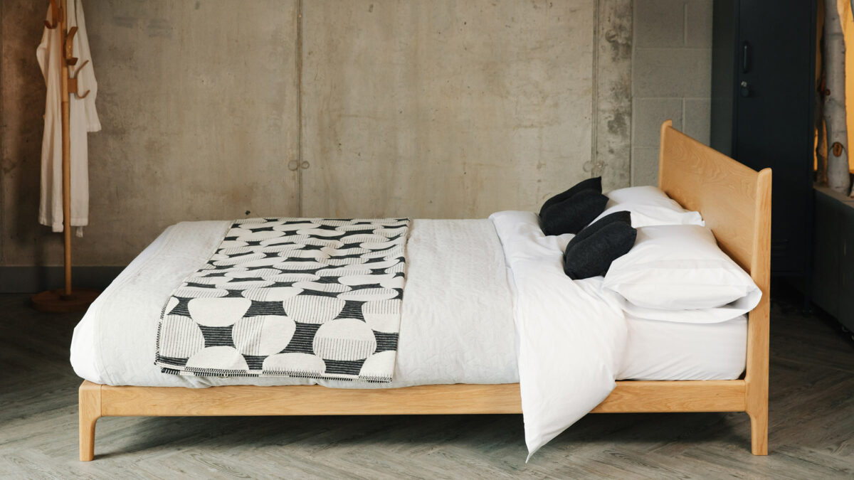 low bed carnaby in solid oak side view
