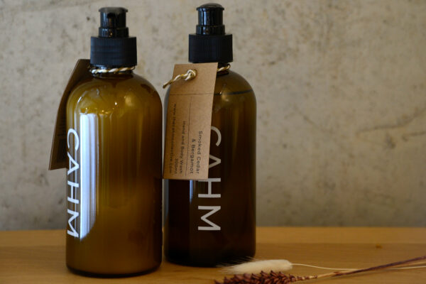 luxury body wash adn lotion in amber glass jars