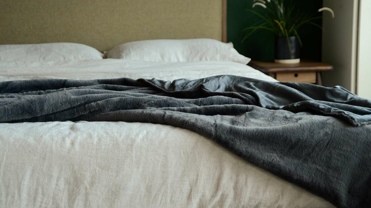 softest luxury faux fur bed throw in charcoal grey
