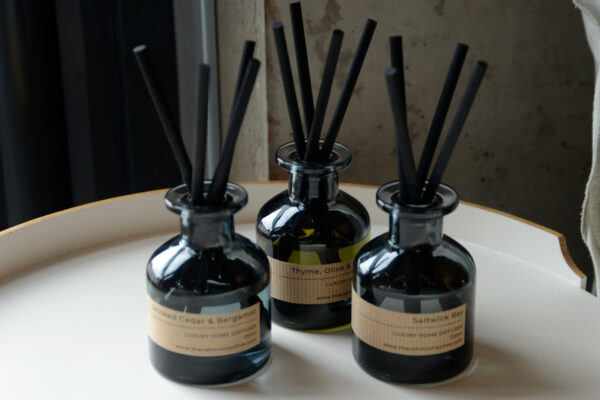 luxury dark and dusky glass room scent diffusers with chunky reeds