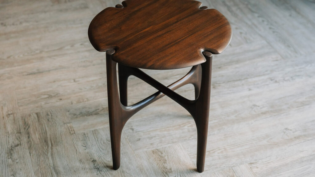 sculptural mid century style dark mahogany side table