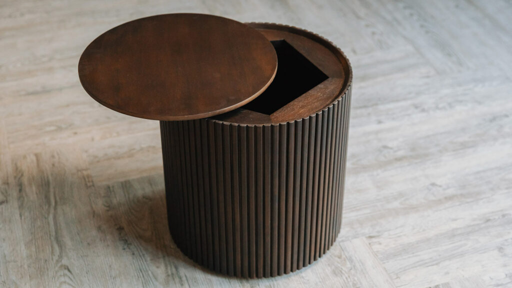 storage stool or side table in dark mahogany shown with lid open