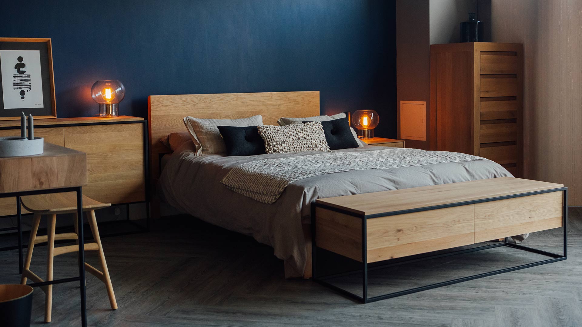 Our hand made Malabar bed in Oak shown with Ethnicraft Monolit storage furniture