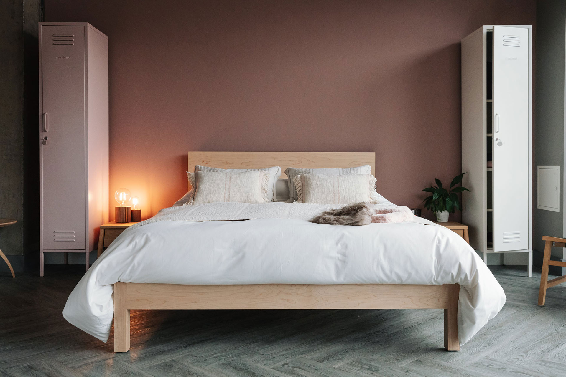 Andas throw and cushions on the Malabar contemporary wooden bed shown in Maple