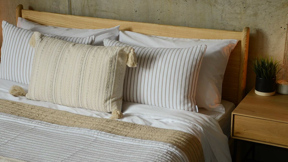 malax cushion and hikari stripe cushions in taupe