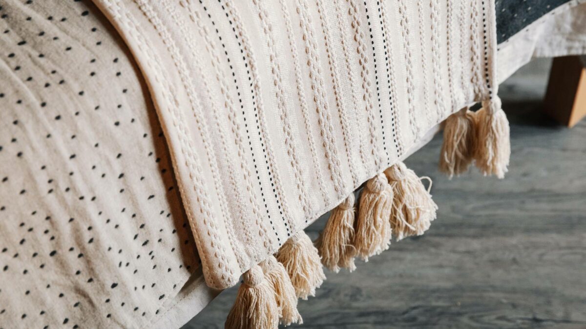 ivory embroidered throw