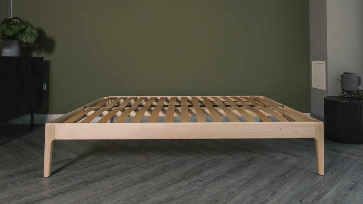 Maple wood Camden bed frame without a headboard and shown without a mattress