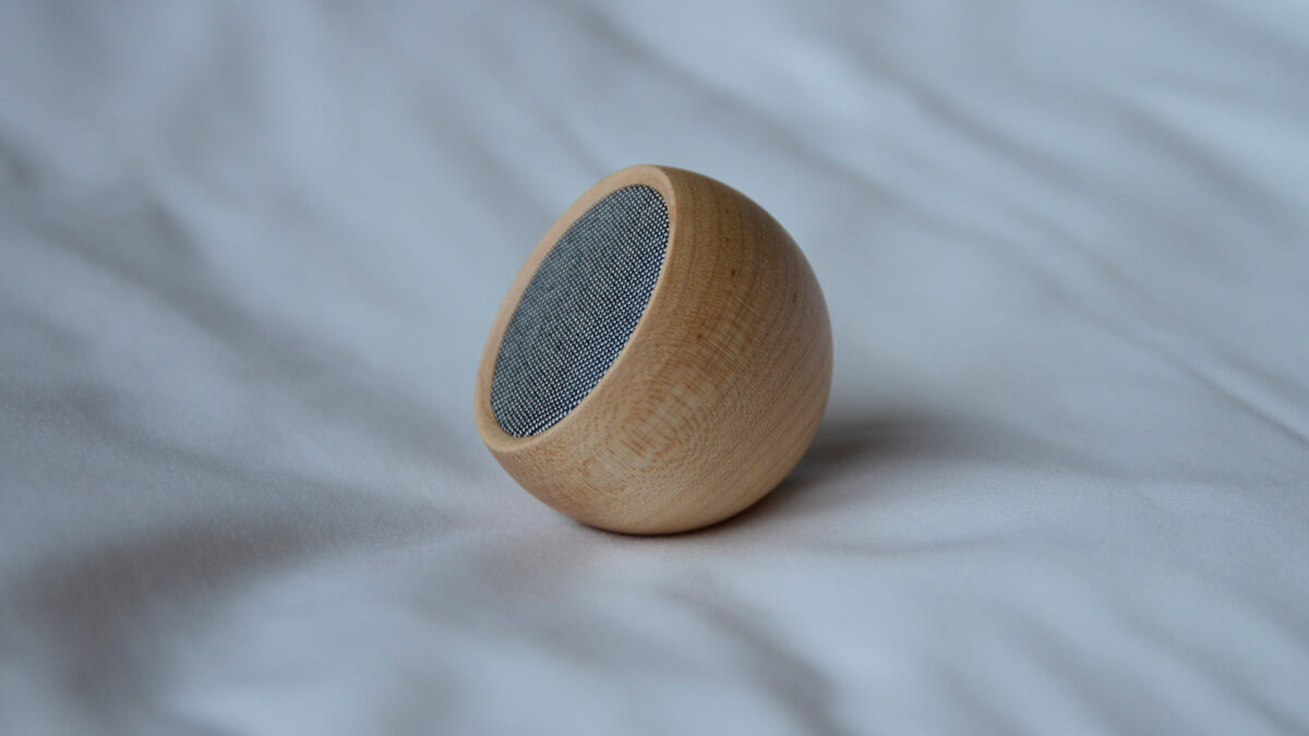 mini bluetooth wooden speaker in maple shown from the side