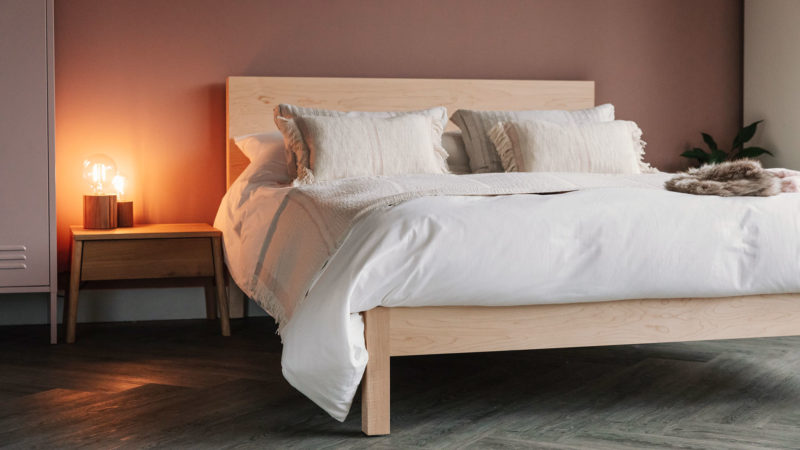 maple wood bed with oak bedside AIR table and Andas throw and cushions