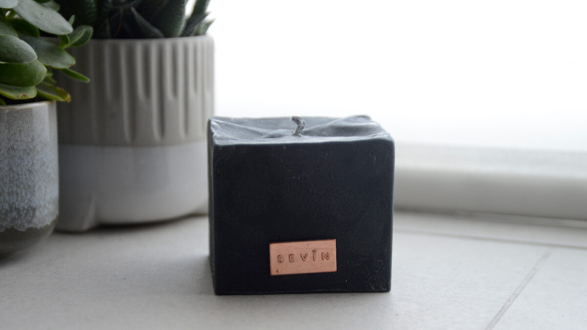 hand made naturally fragranced black candle by Sevin