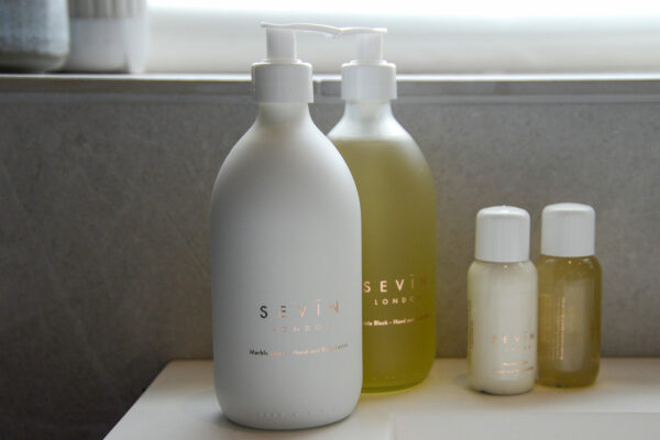 Sevin luxury natural bathroom toiletries including liquid hand soap and hand lotion