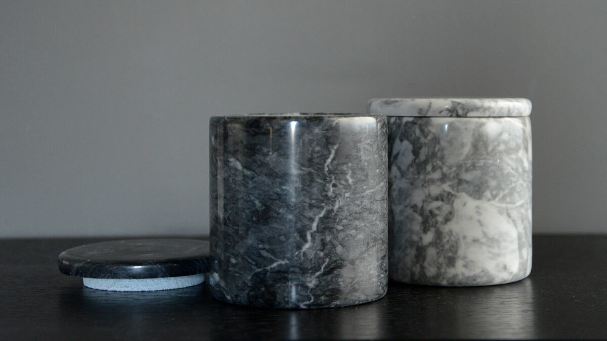 modern luxury scented candles in marble lidded pots