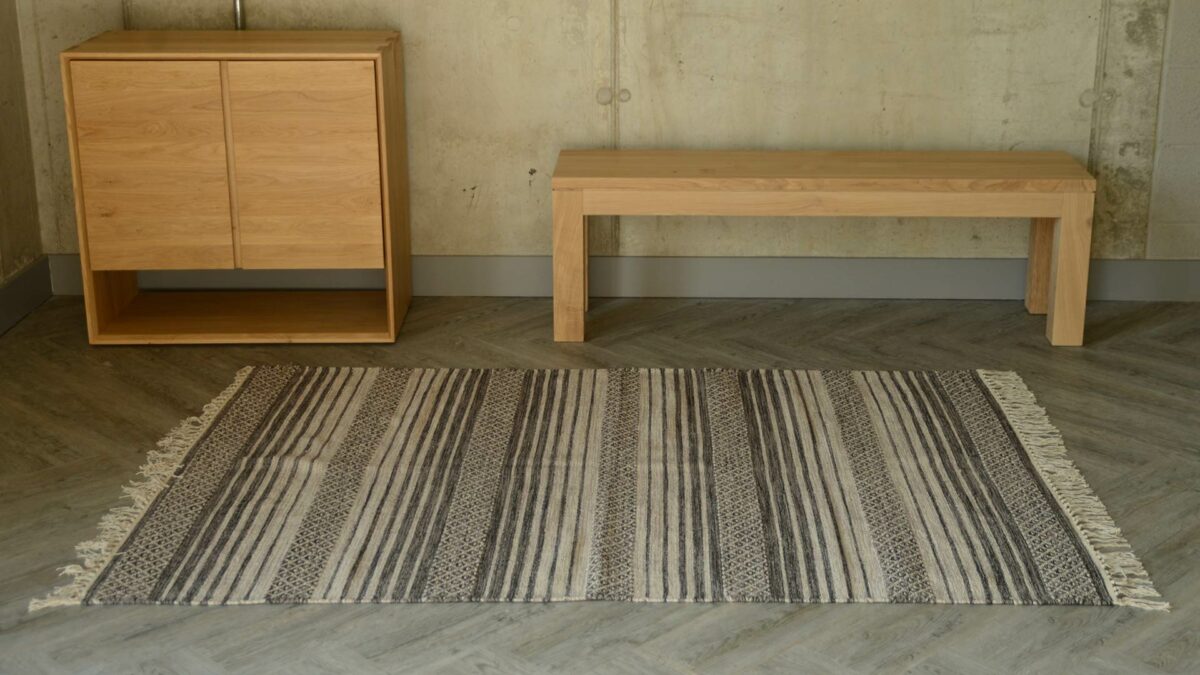 medium size woven rug with striped pattern