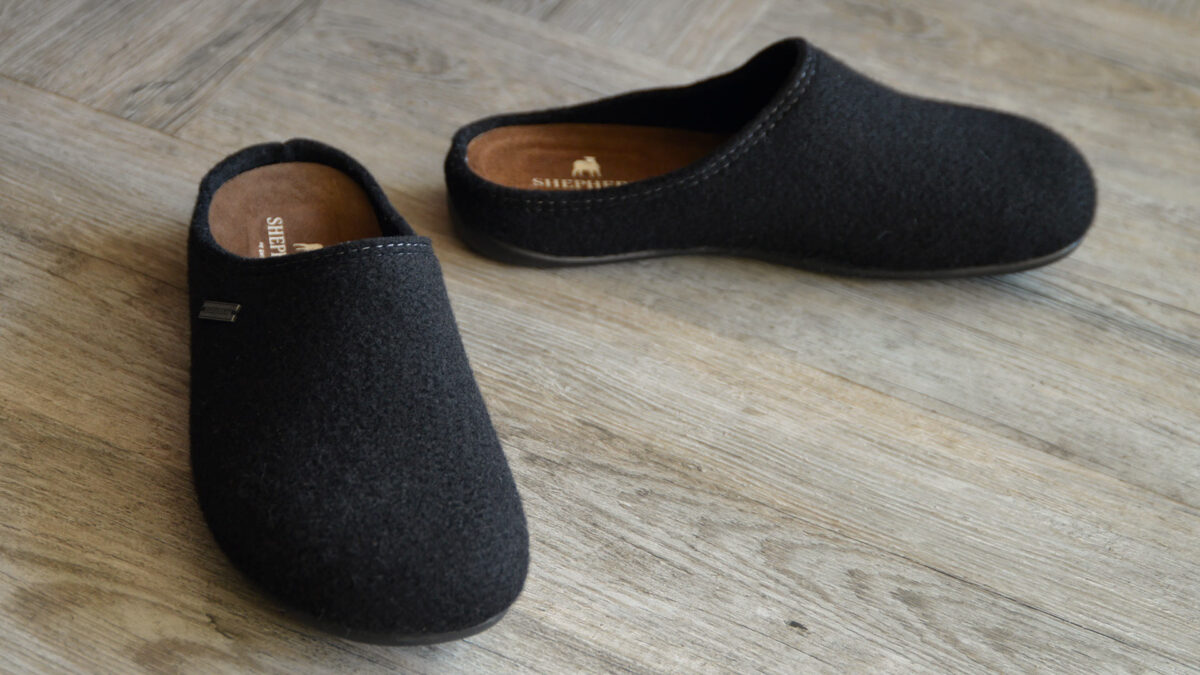 pair of men's black slippers.