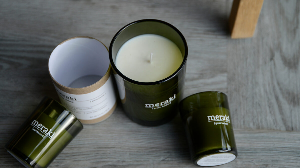 Meraki scented candles in green glass jars