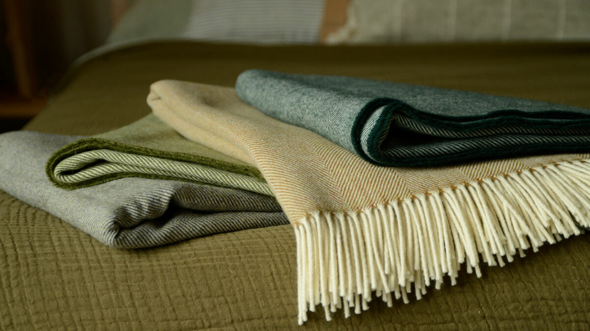 merino herringbone throws botanical shades