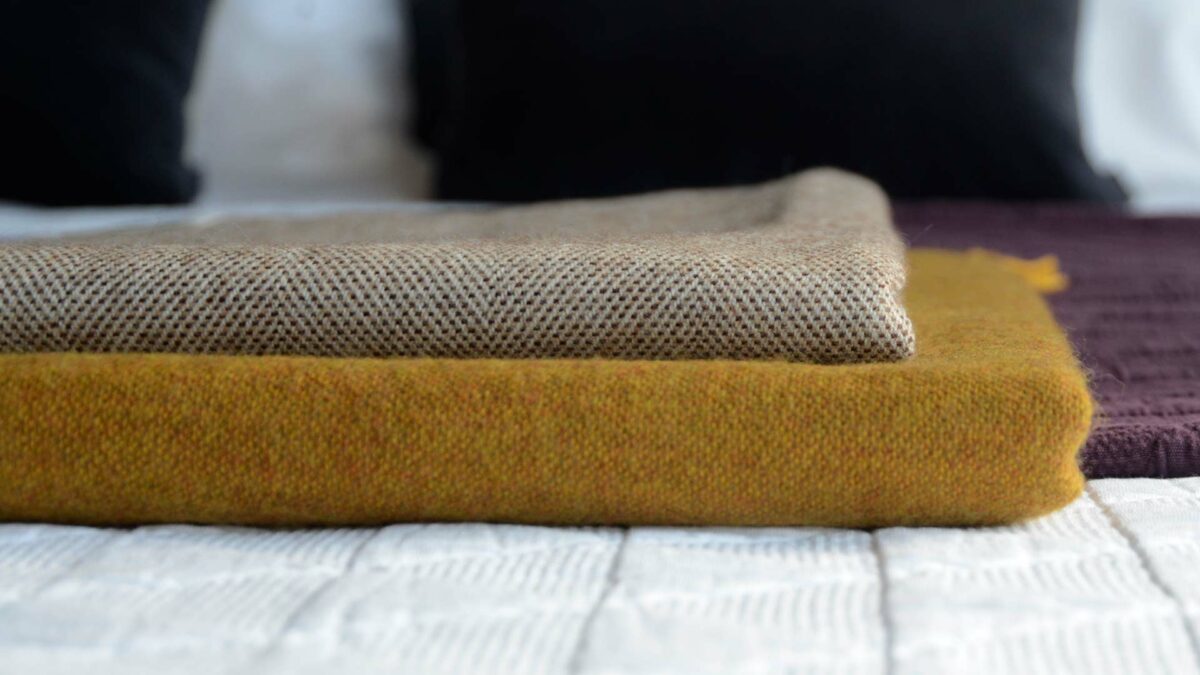 merino lambswool throws saffron and ivory chocolate blend