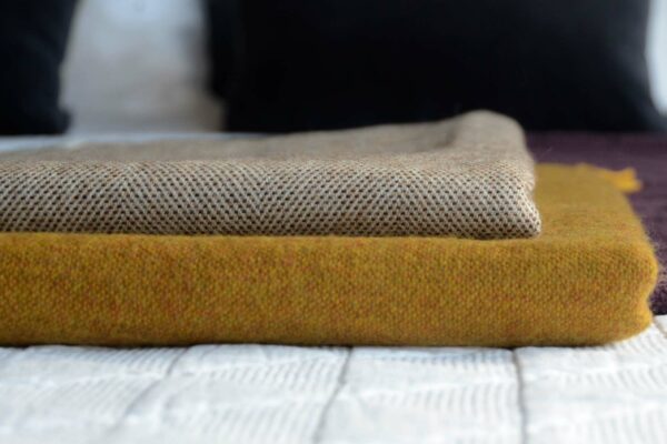merino lambswool throws saffron and ivory chocolate blend