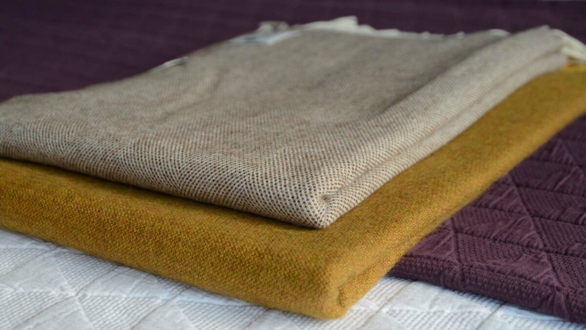 merino throws deep saffron or chocolate spot