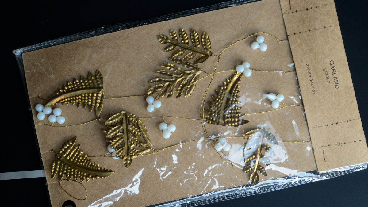 metal leaf garland in packaging
