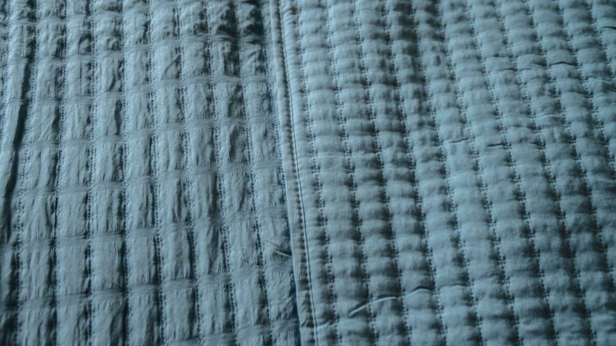 mid blue quilted bedspread