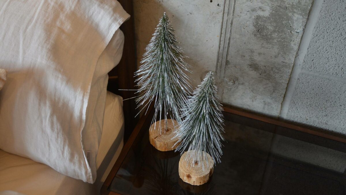 frosted bristle christmas trees with wood bases