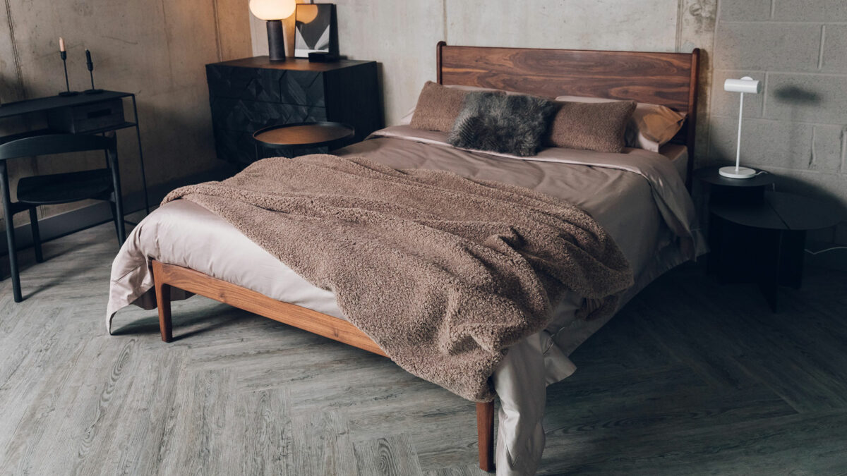 mink bedding with faux fur accessories on walnut oiled Camden bed