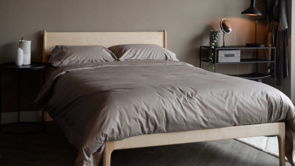 soft sheen Egyptian cotton bedding in mink colour shown on a Maple Camden bed