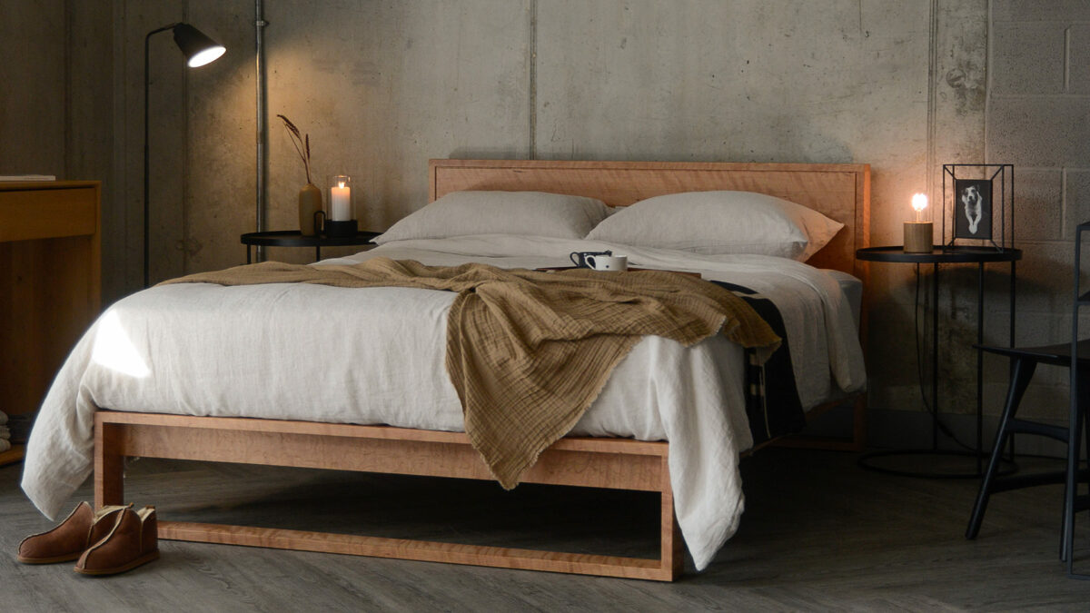 Minimalist lines Leith bed hand made from solid cherry wood