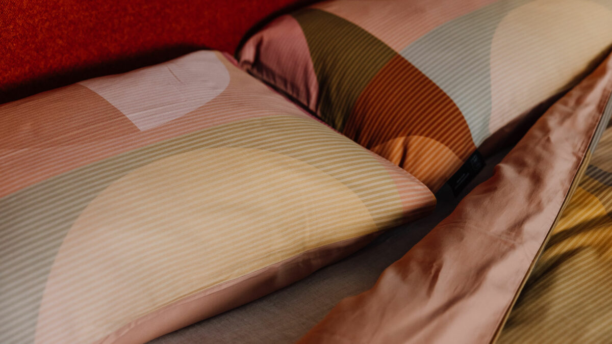 modern printed bedding circle pattern autumn colourway