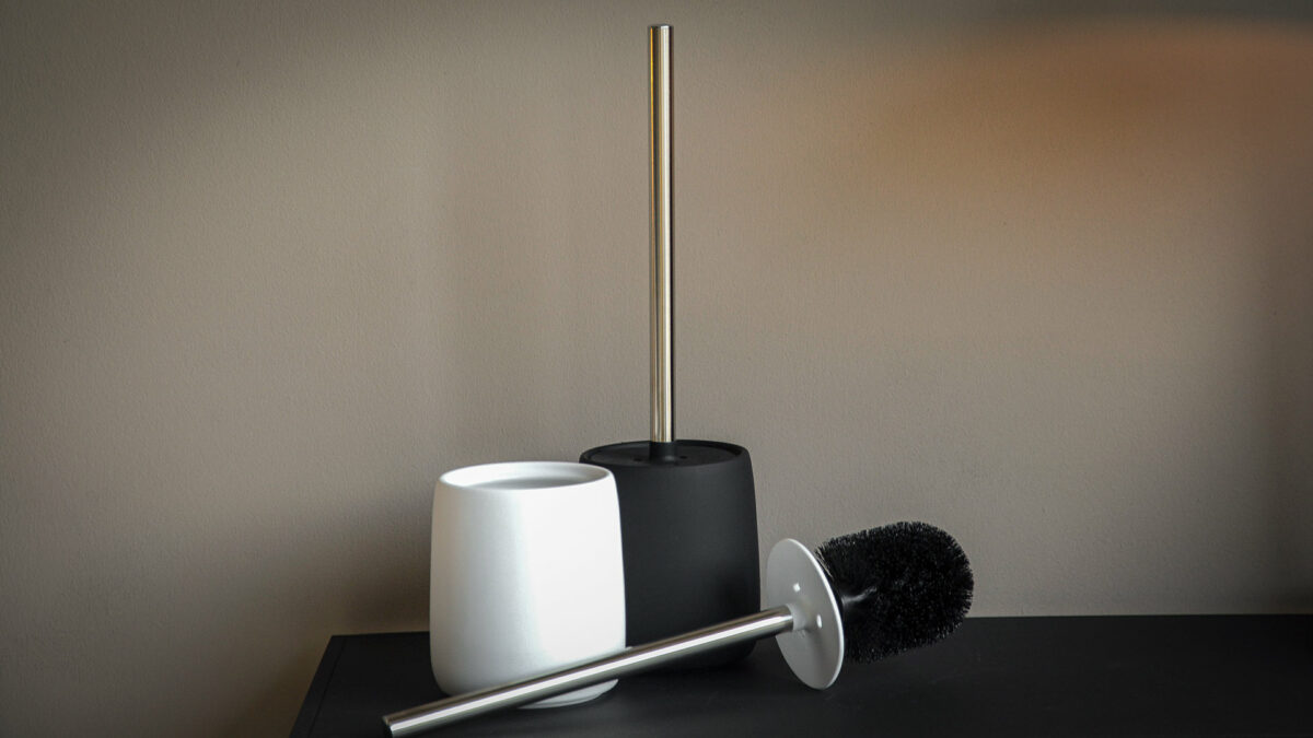 soft touch toilet brush set with stainless steel handles in black and white