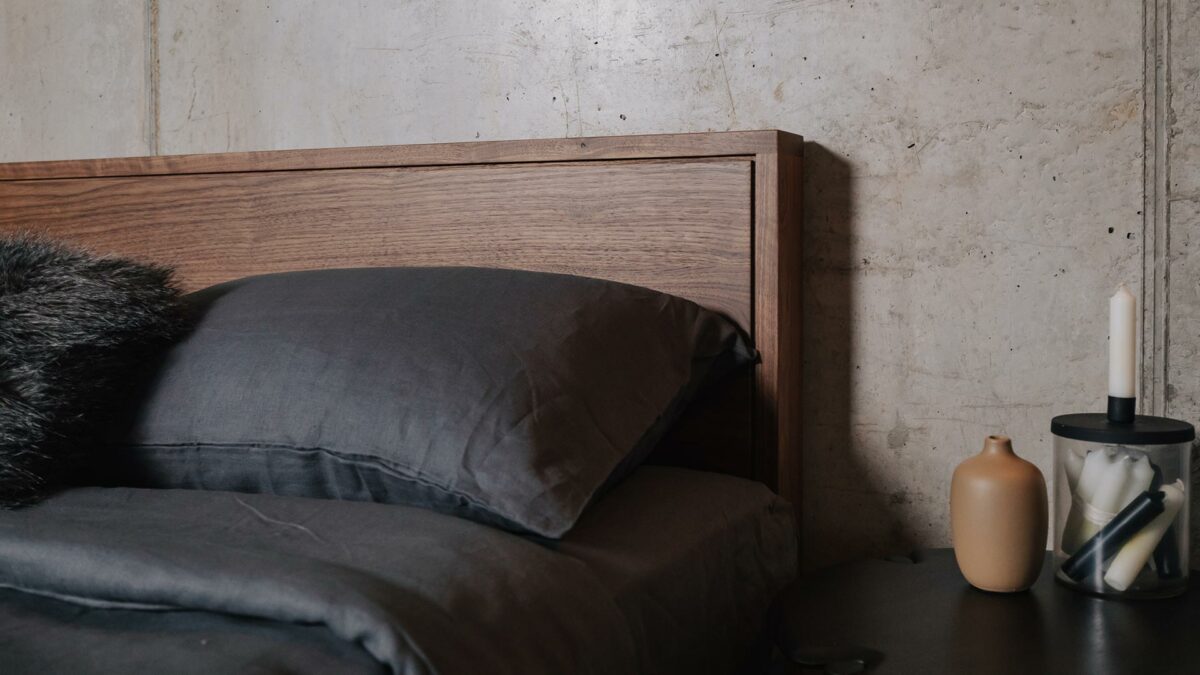 dark grey linen bedding on a kingsize walnut Leith bed for a Nordic look