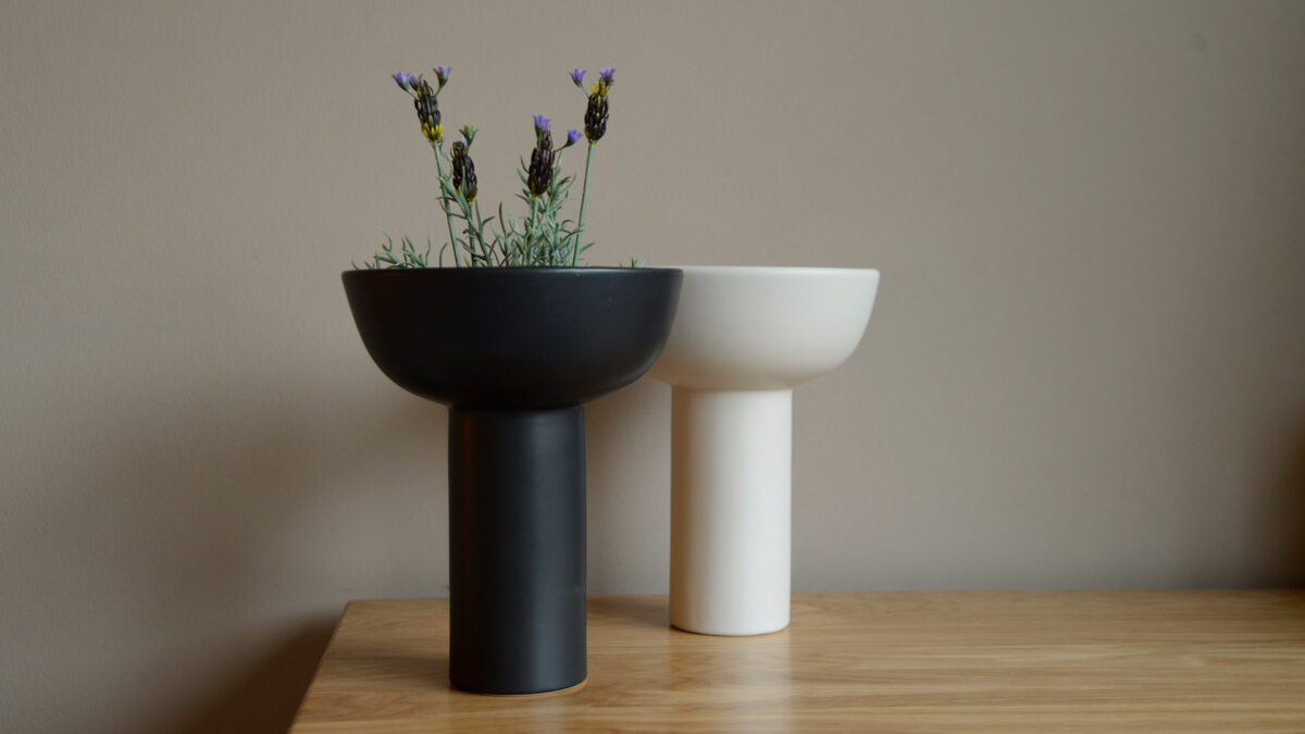modern ceramic vases in ivory and black