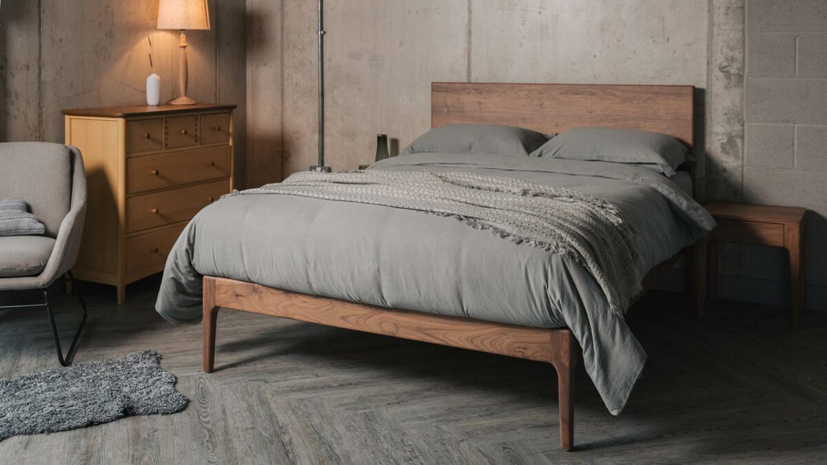 Chiswick a solid wooden bed with taller headboard here made from walnut wood