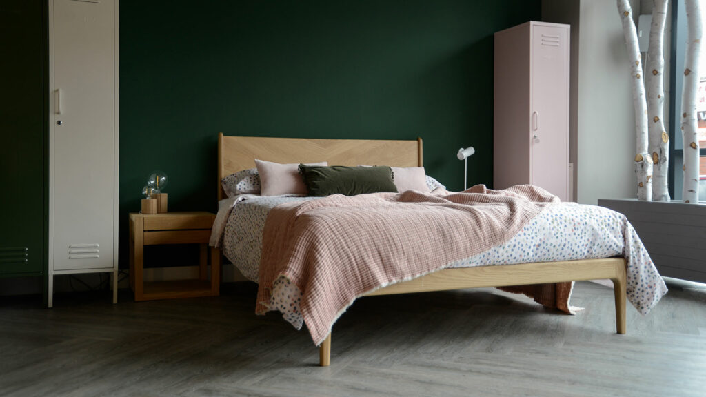 Spring summer bedding, pastel paint brush dots print duvet set shown on our Oak Hoxton Bed