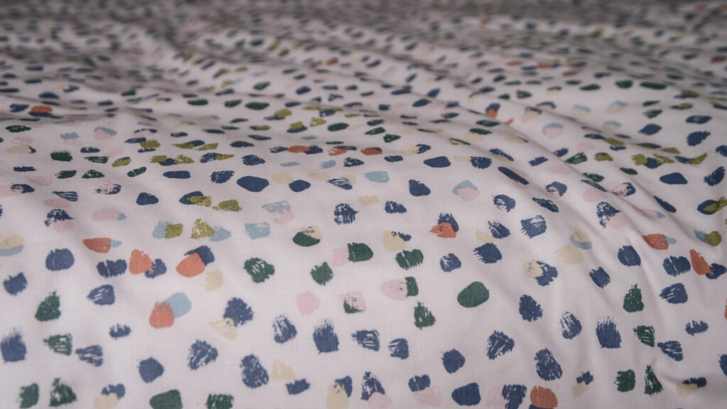 cotton blend duvet cover set with paint brush dots pattern a close up view