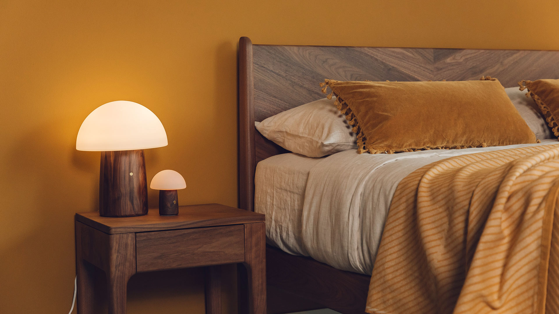 Bedside table with shop lamp attached