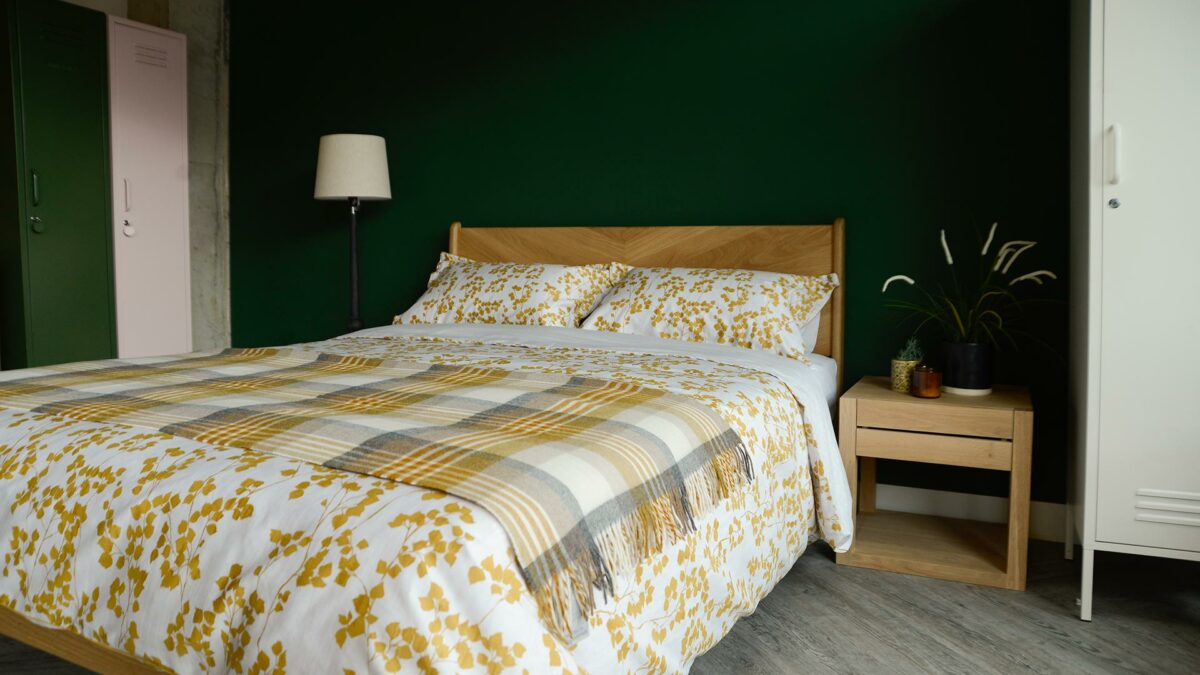 Duvet cover set in white with a mustard yellow leaf print