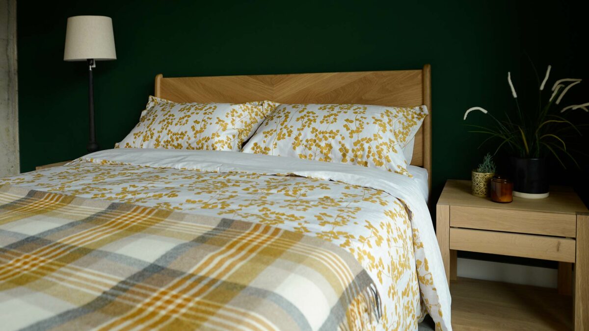 duvet cover set in white with a mustard yellow leaf print