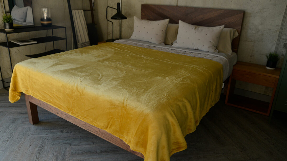 softest microfibre throw in Mustard yellow