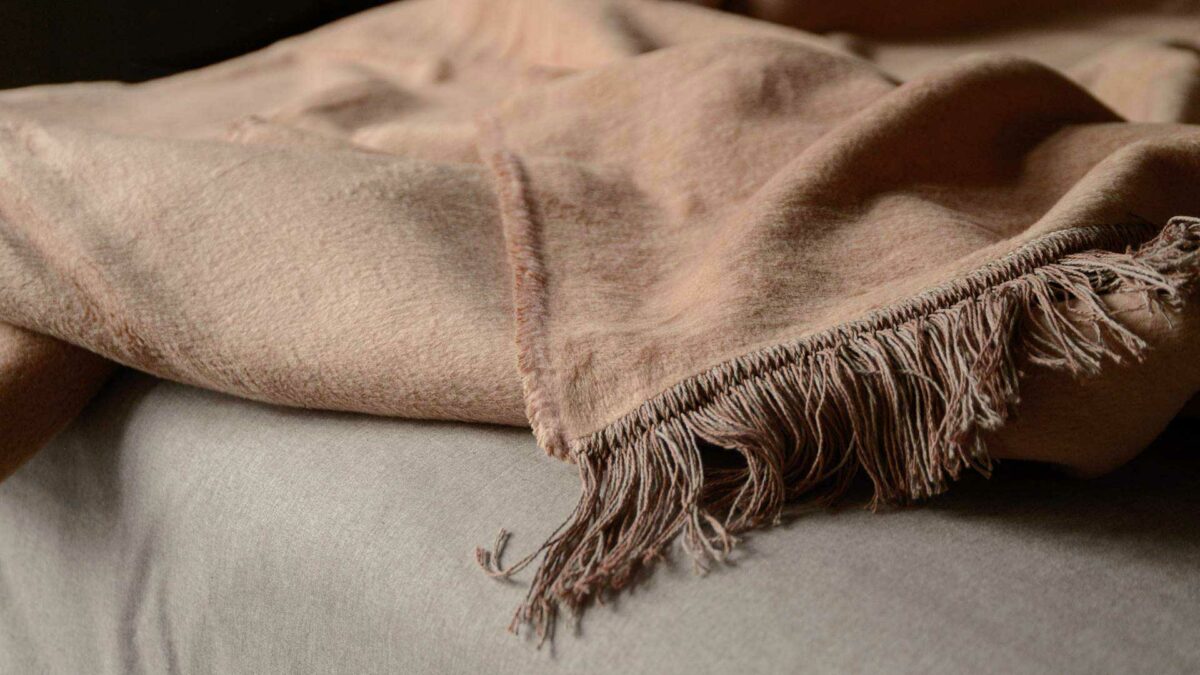 softest cosy blush coloured blanket with fringe