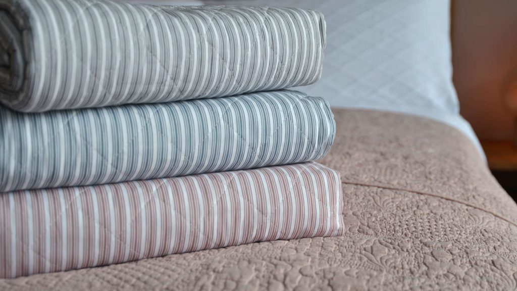 multi-stripe quilted blankets