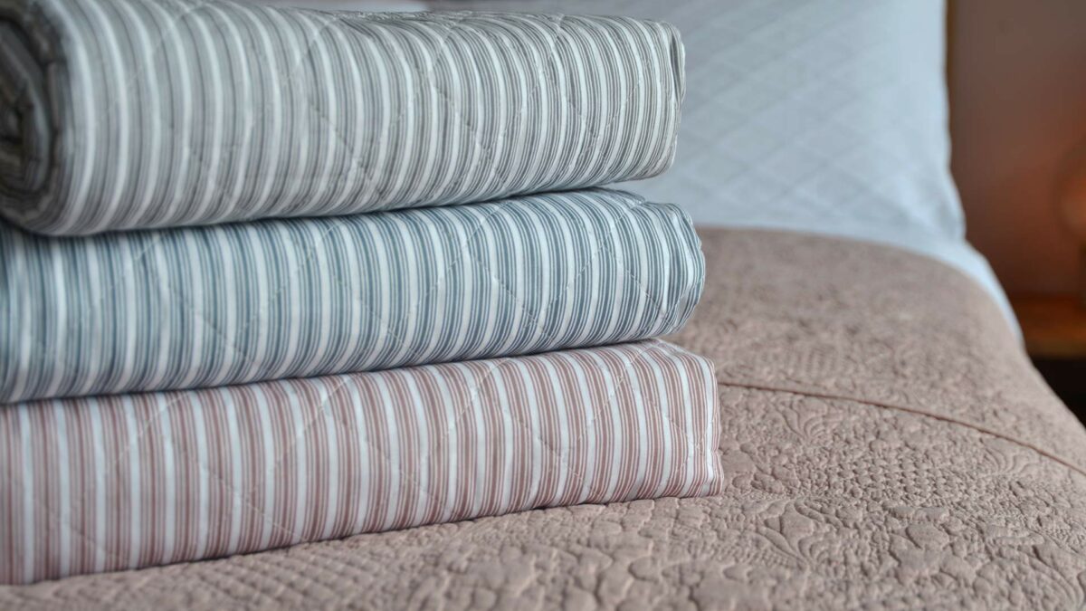 muti stripe quilted throw 3 colours stack