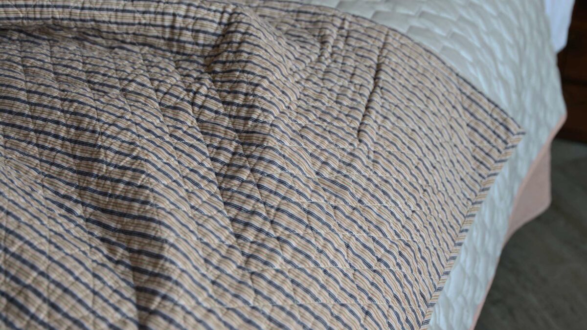 navy-striped-pattern-quilted-throw