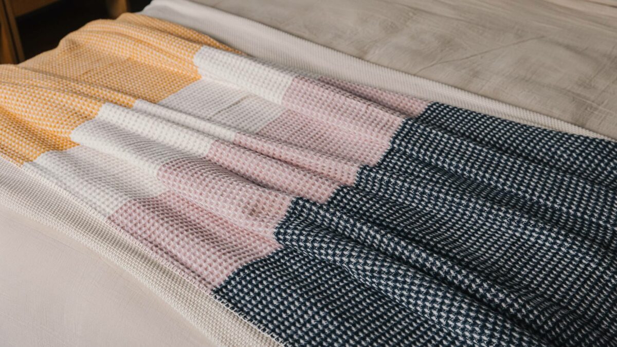 navy white orange and pink waffle throw