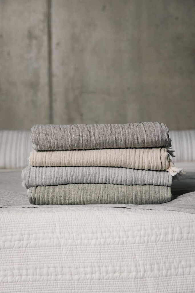 neutral bedding crinkle texture throws portrait