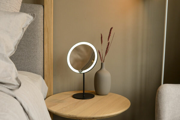 magnifying mirror with LED light shown with light on