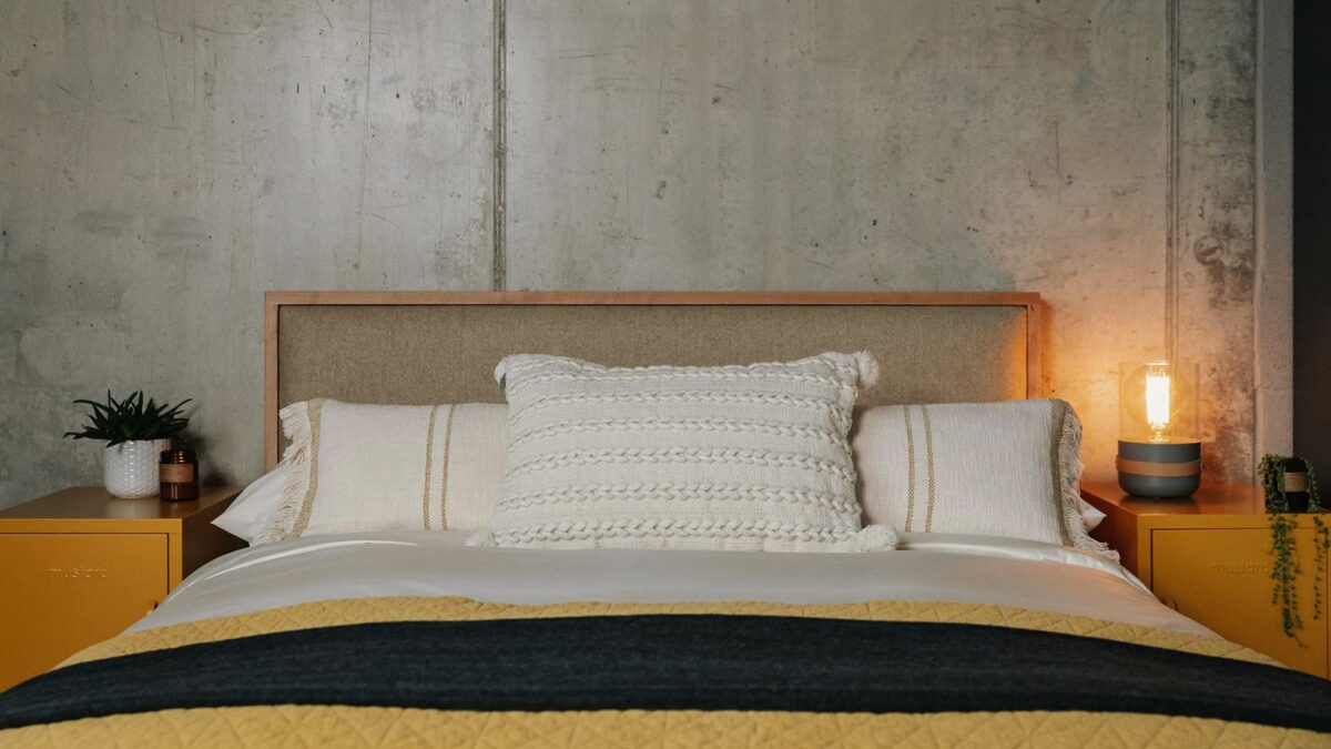 new cream cushions with mustard lockers and grey strap lamp