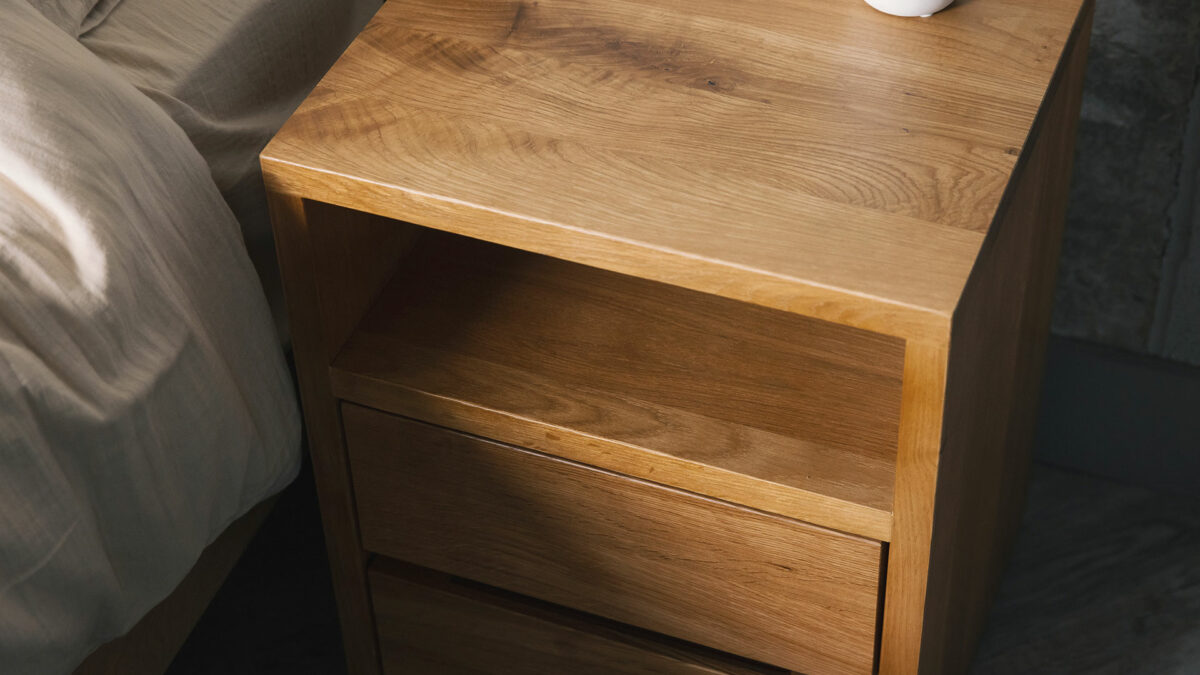 Black Lotus solid oak bedside table with 2 drawers and an open shelf shown from above